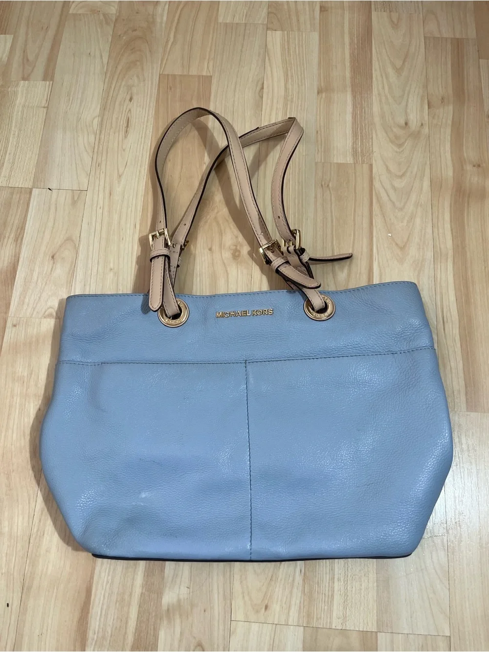 Michael Kors Bedford tote is crafted from pebbled leather light Blue